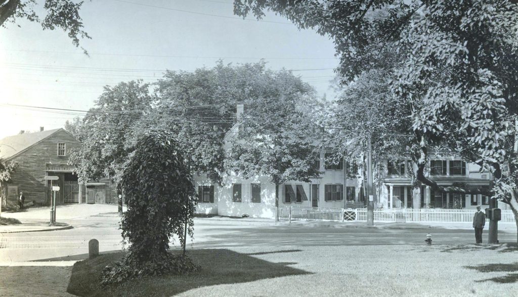 The Kimball Farmer House is at the center of this 1919 image. The massive barn at left served his “Foot of the Rocks Farm.” It could be assumed that this photograph was intended as a sort of “beauty shot” of the Farmer property, but in fact it was part of a series of images taken at different angles in the aftermath of a trolley-car accident. Note a member of the public transit investigation team, standing at right. Click the photograph to enlarge its many details.